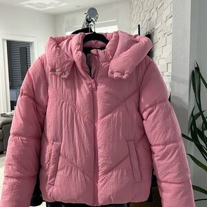 Primark Pink Hooded Puffer Jacket. Fleece lined. Front pockets. Size 13-14yrs.